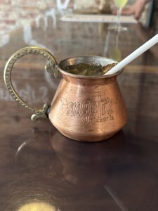 "Strong and boozy cocktail with a mix of spirits - Long Island Iced Tea in a tall glass filled with ice, featuring vodka, tequila, rum, gin, triple sec, and sour mix, topped with cola. Garnished with a lemon wheel. A potent and flavorful libation that packs a punch.