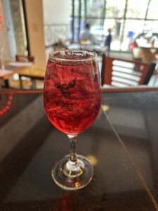 Colorful and fruity wine-based cocktail - Sangria in a pitcher or glass, featuring red or white wine, chopped fruits like oranges, lemons, and apples, and optional additions like brandy, soda, or sweeteners. A refreshing and vibrant drink perfect for gatherings and celebrations.